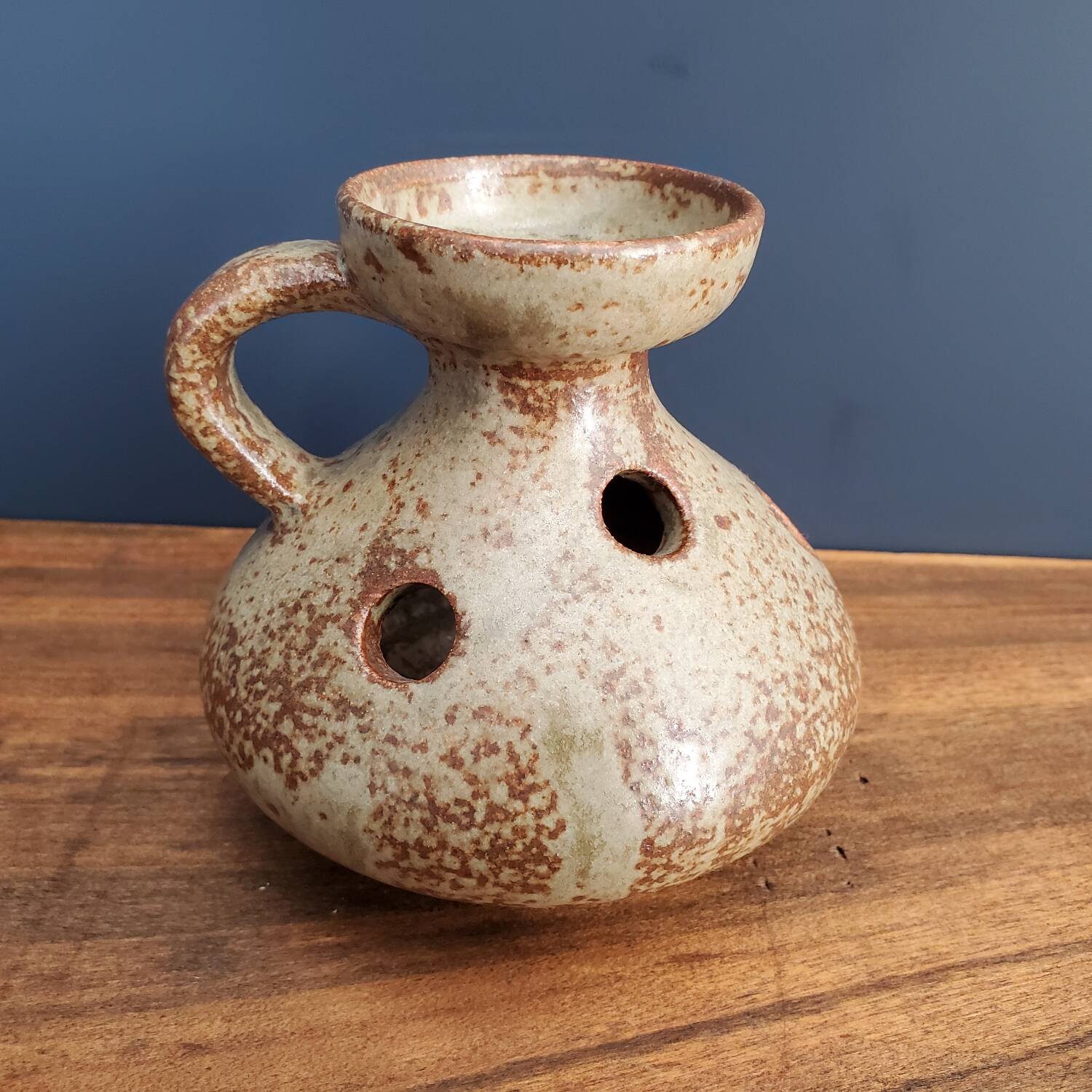 Stoneware cellar rat candle holder
