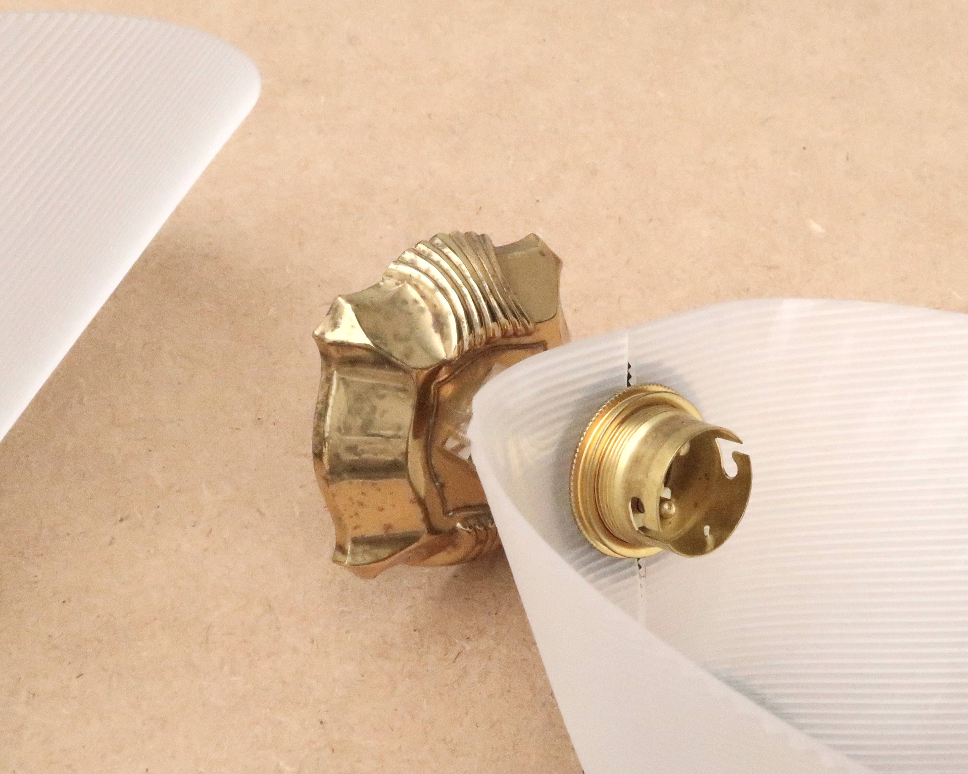 Pair of white and gold wall lights, 1950s