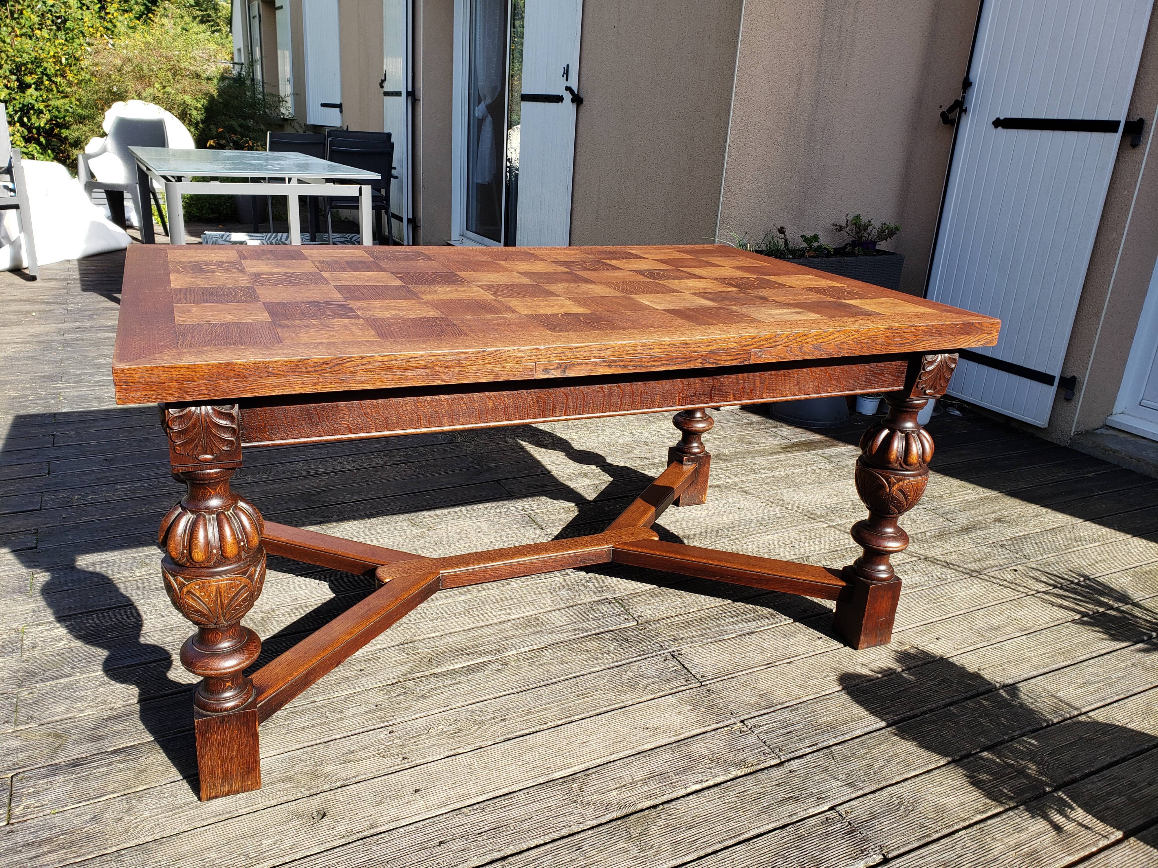 1910s Jacobean style solid oak extending drawer dining table