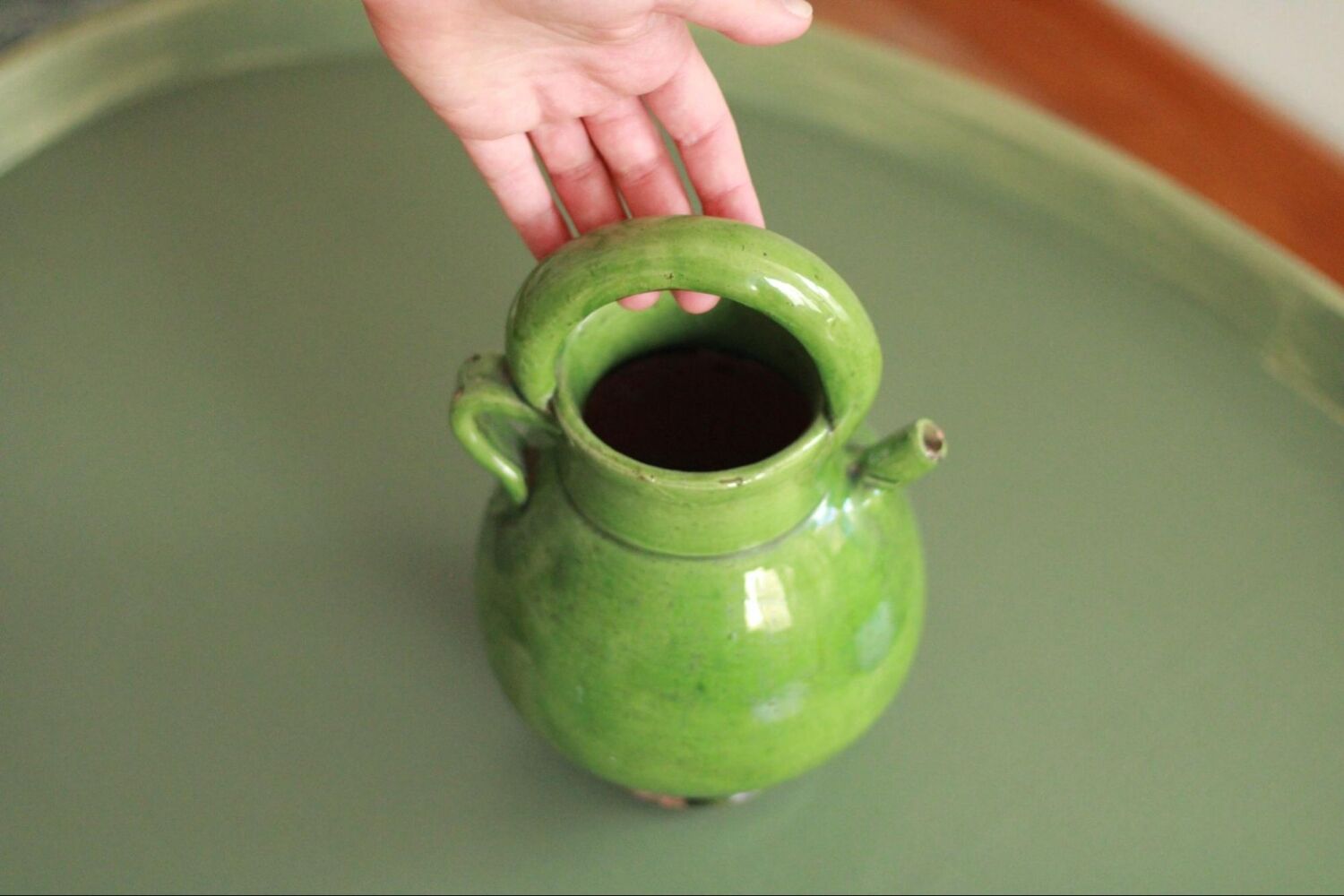 Old ceramic enamelled pitcher vase