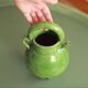 Old earthenware enamelled pitcher vase