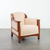 Art Nouveau design armchair with a luxurious light fabric upholstery