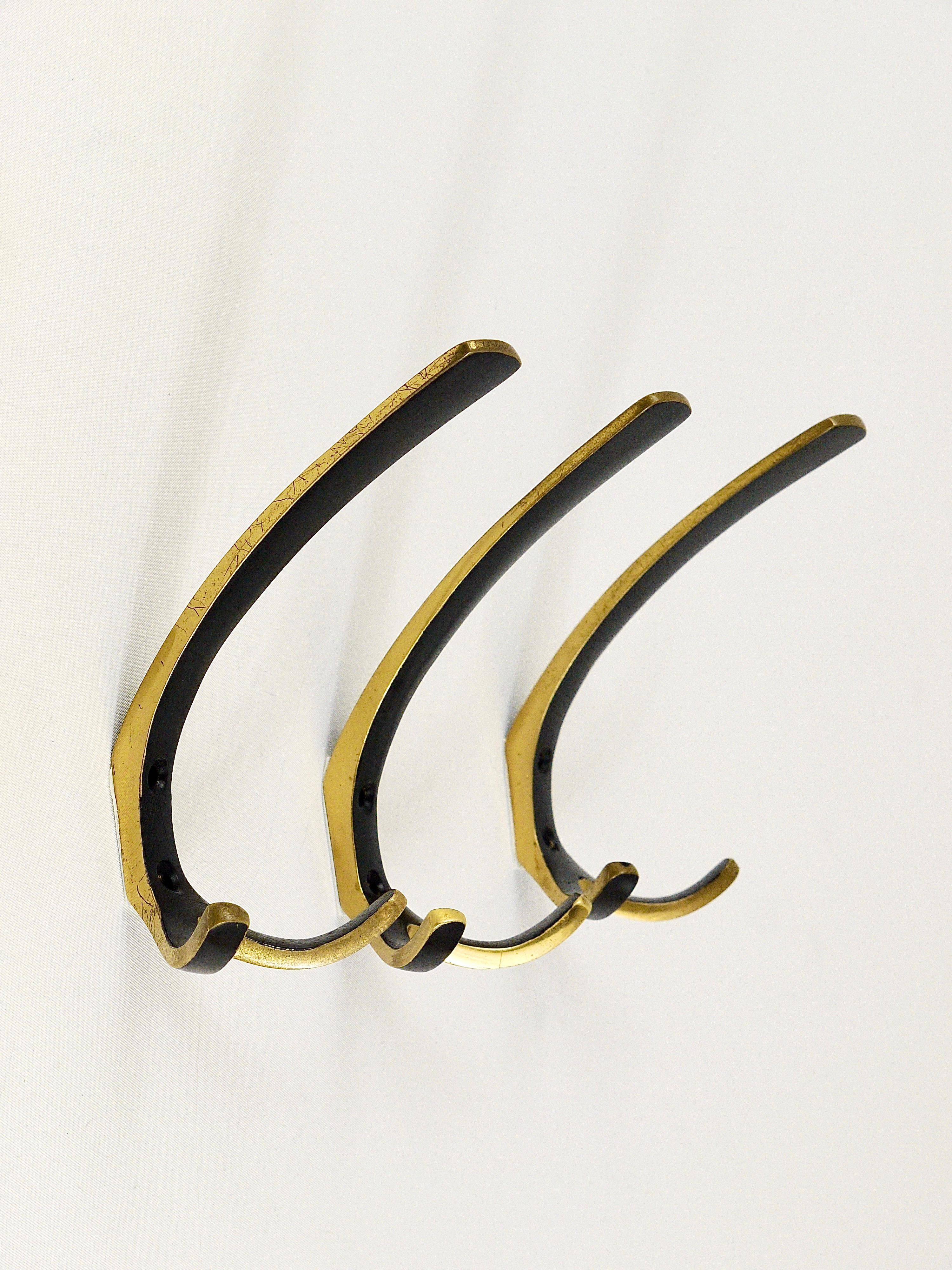 Up to 2 double wall hooks in brass from the mid-century by Herta Baller, Austria, 1950s.