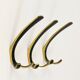 Up to 2 double wall hooks in brass from the mid-century by Herta Baller, Austria, 1950s.