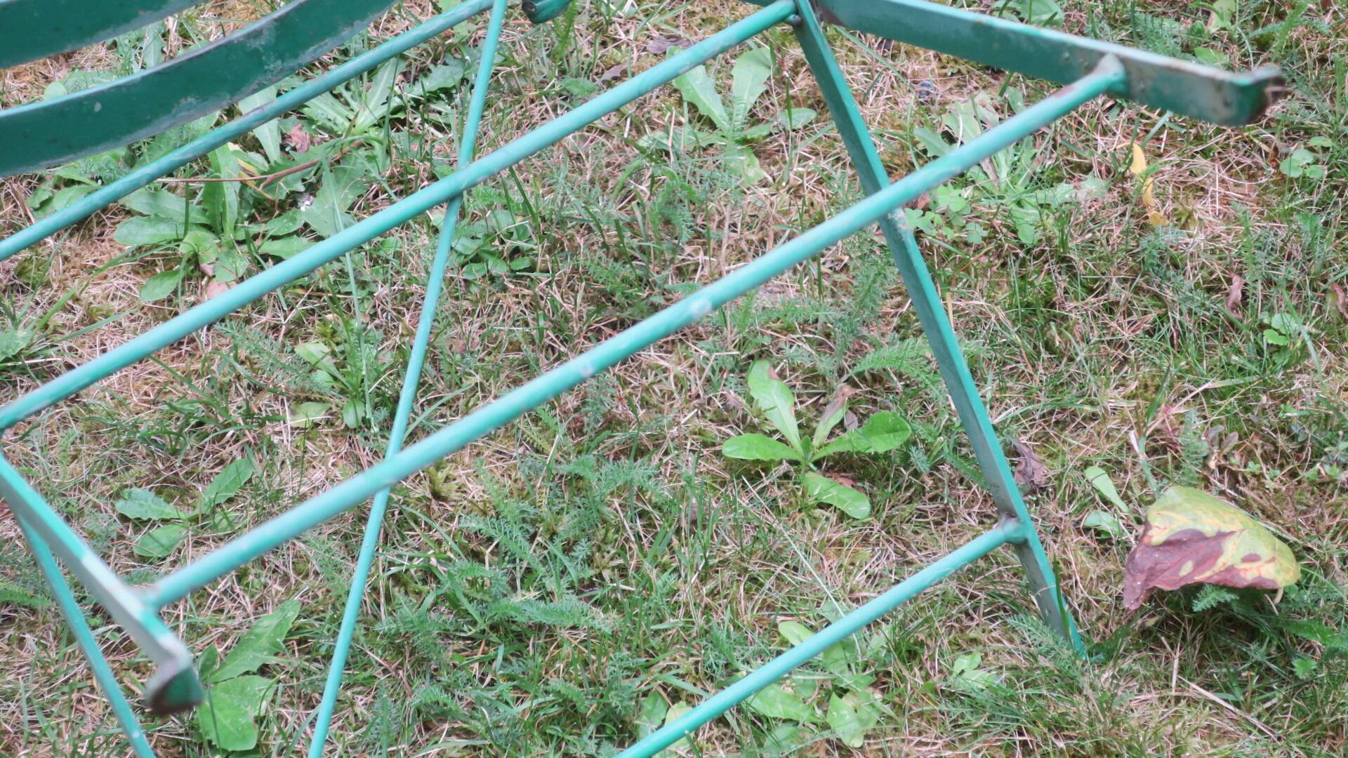 Pair of mid century distressed painted iron garden chairs