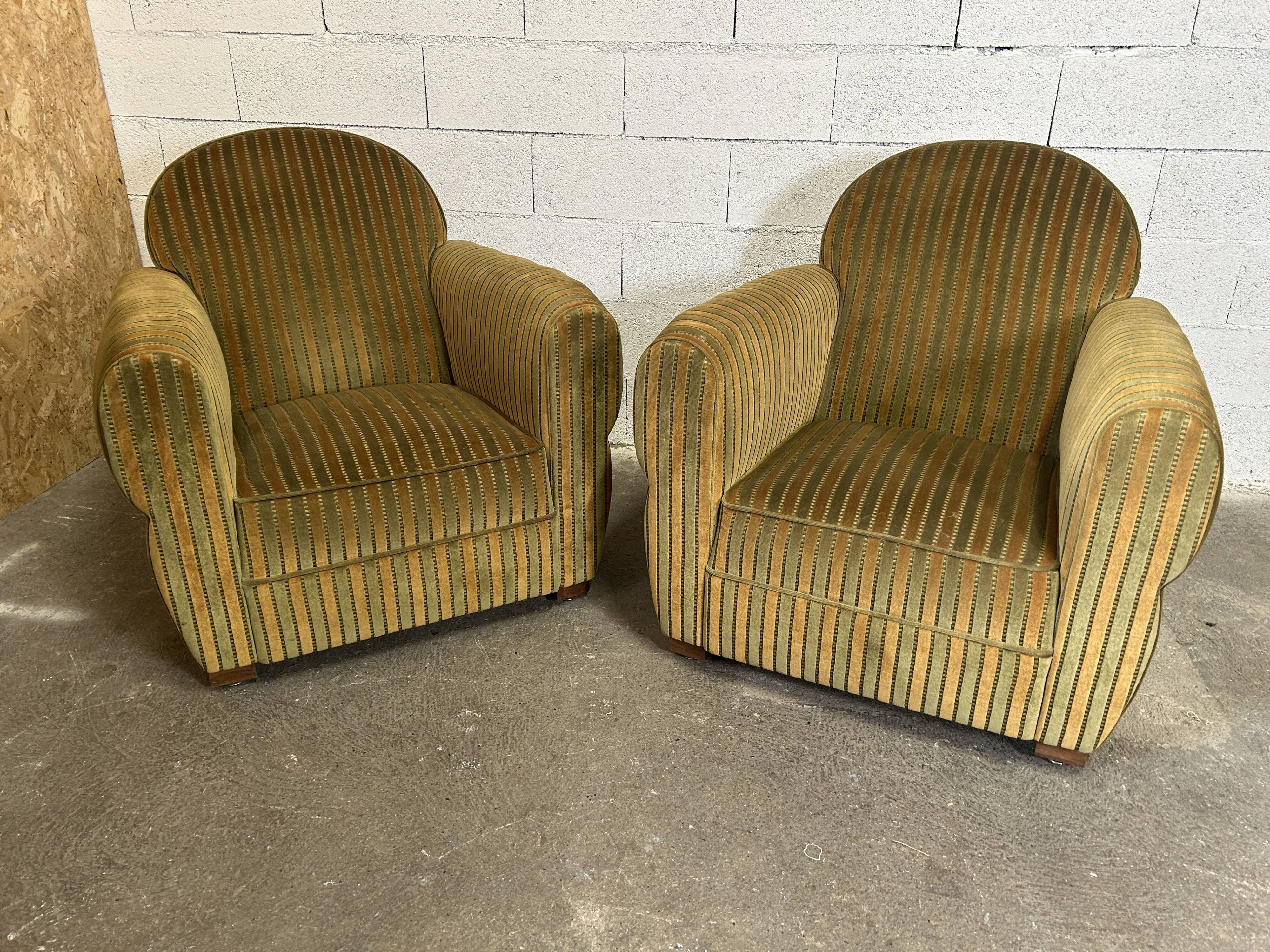 Pair of green fabric armchairs