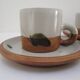 Four pottery cups and saucers from La Colombe Vallauris