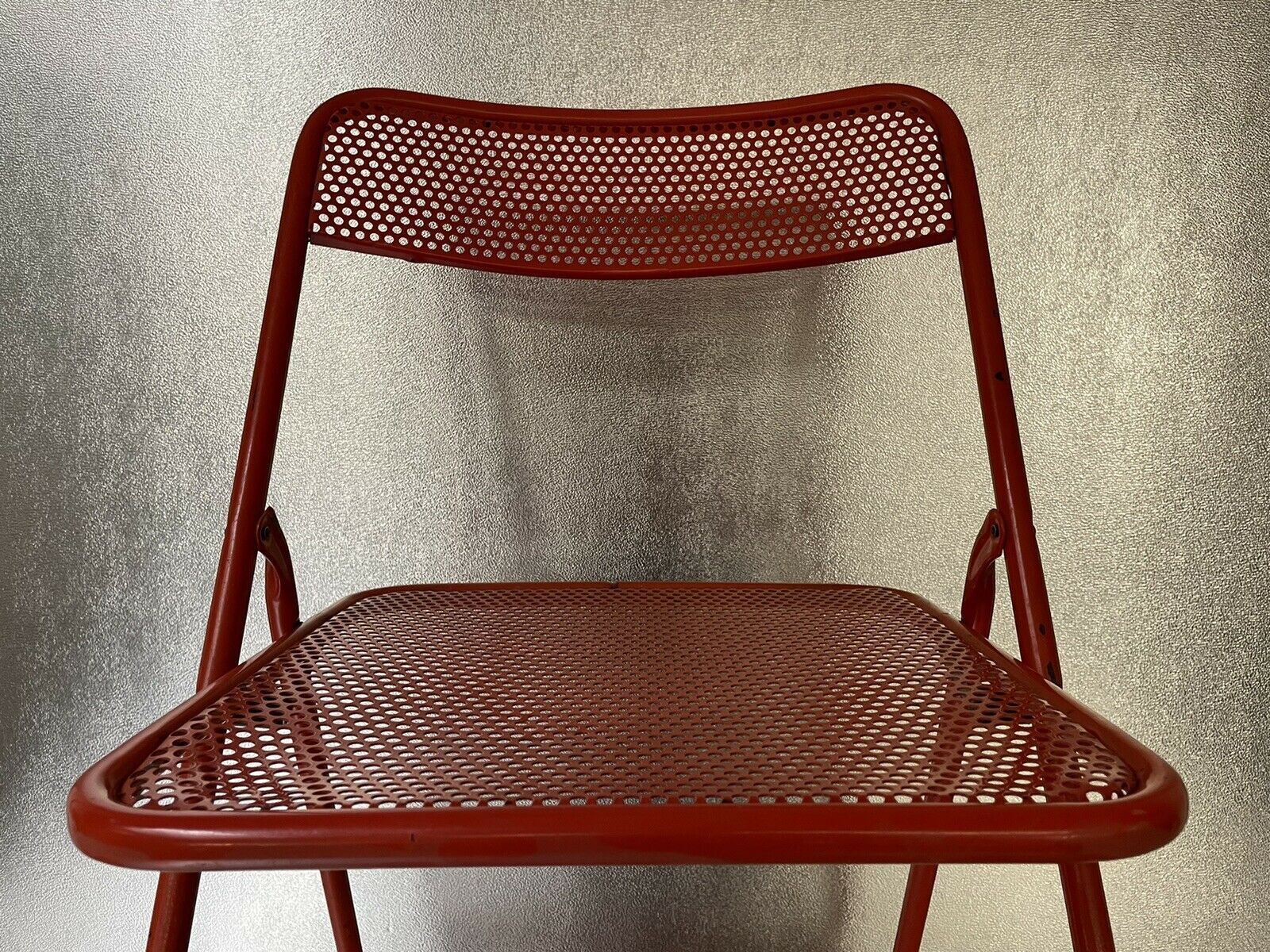 Old folding chair metal perforated red 60s, 70s, vintage