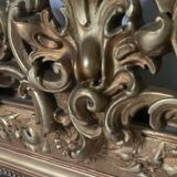 Golden fireplace mirror with pediment