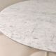 Round table in Carrara marble by Eero Saarinen for Knoll