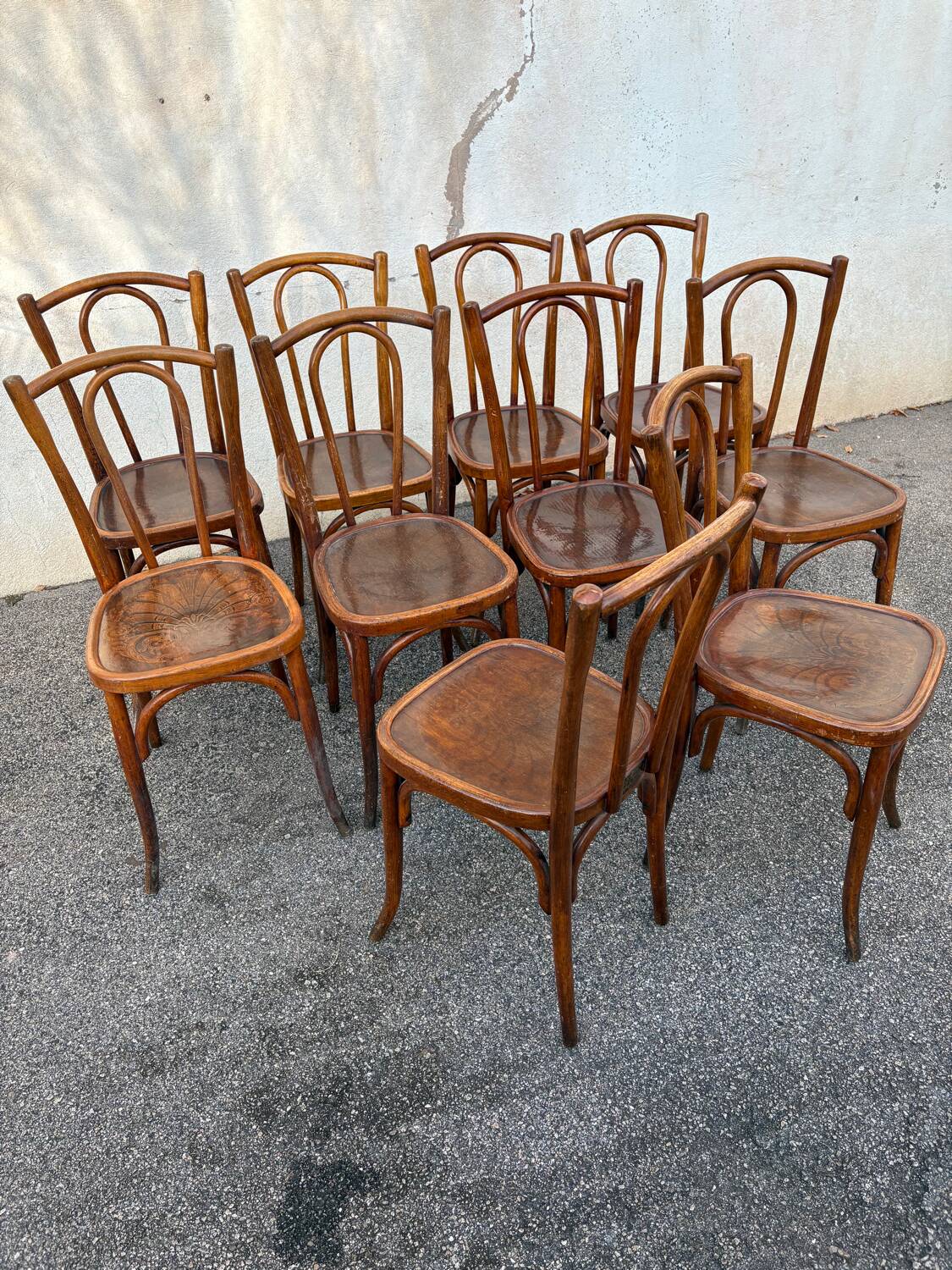 10 varnished patterned bistro chairs