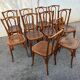 10 varnished patterned bistro chairs
