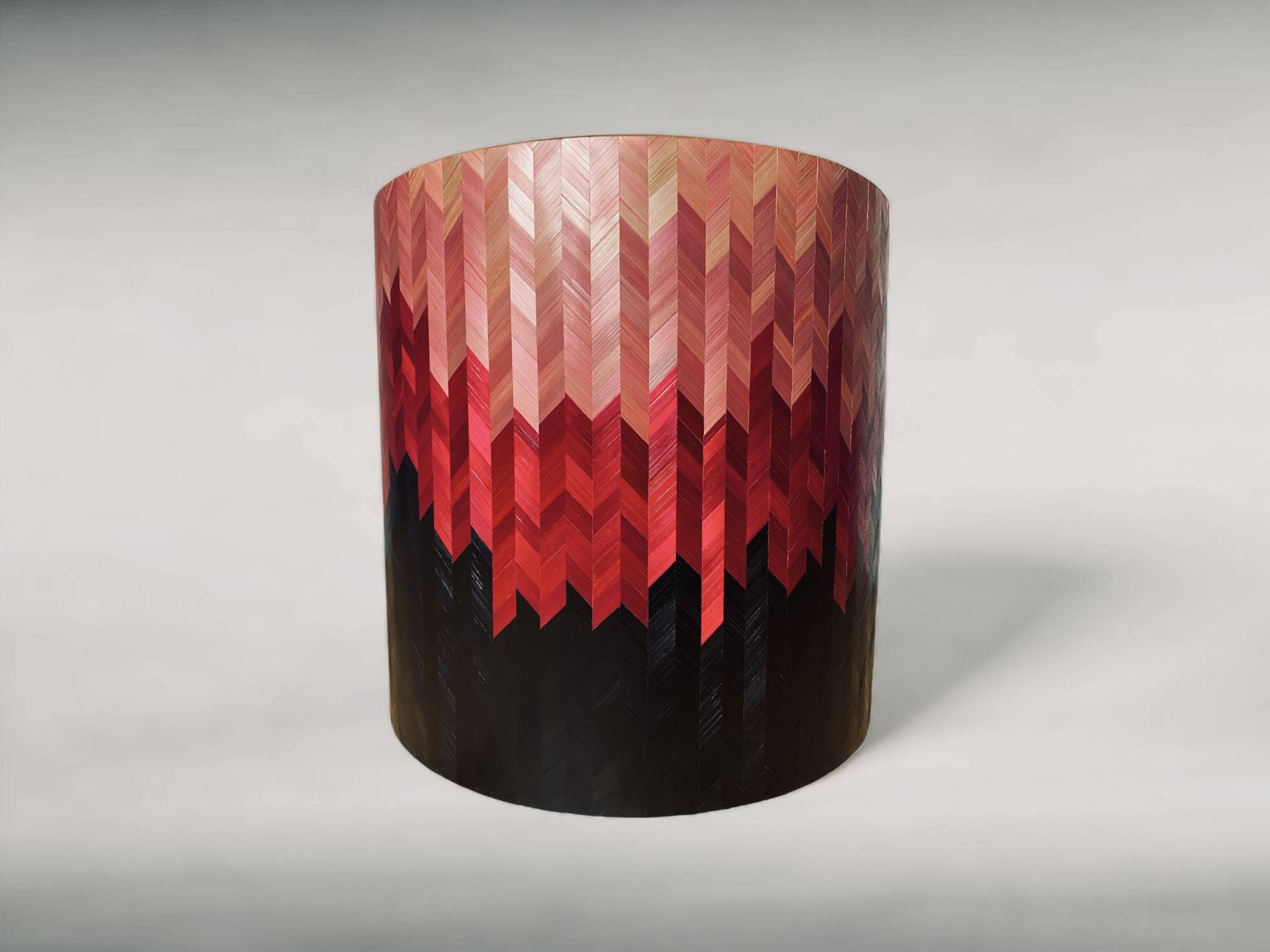 Side table with straw/inlaid concrete.