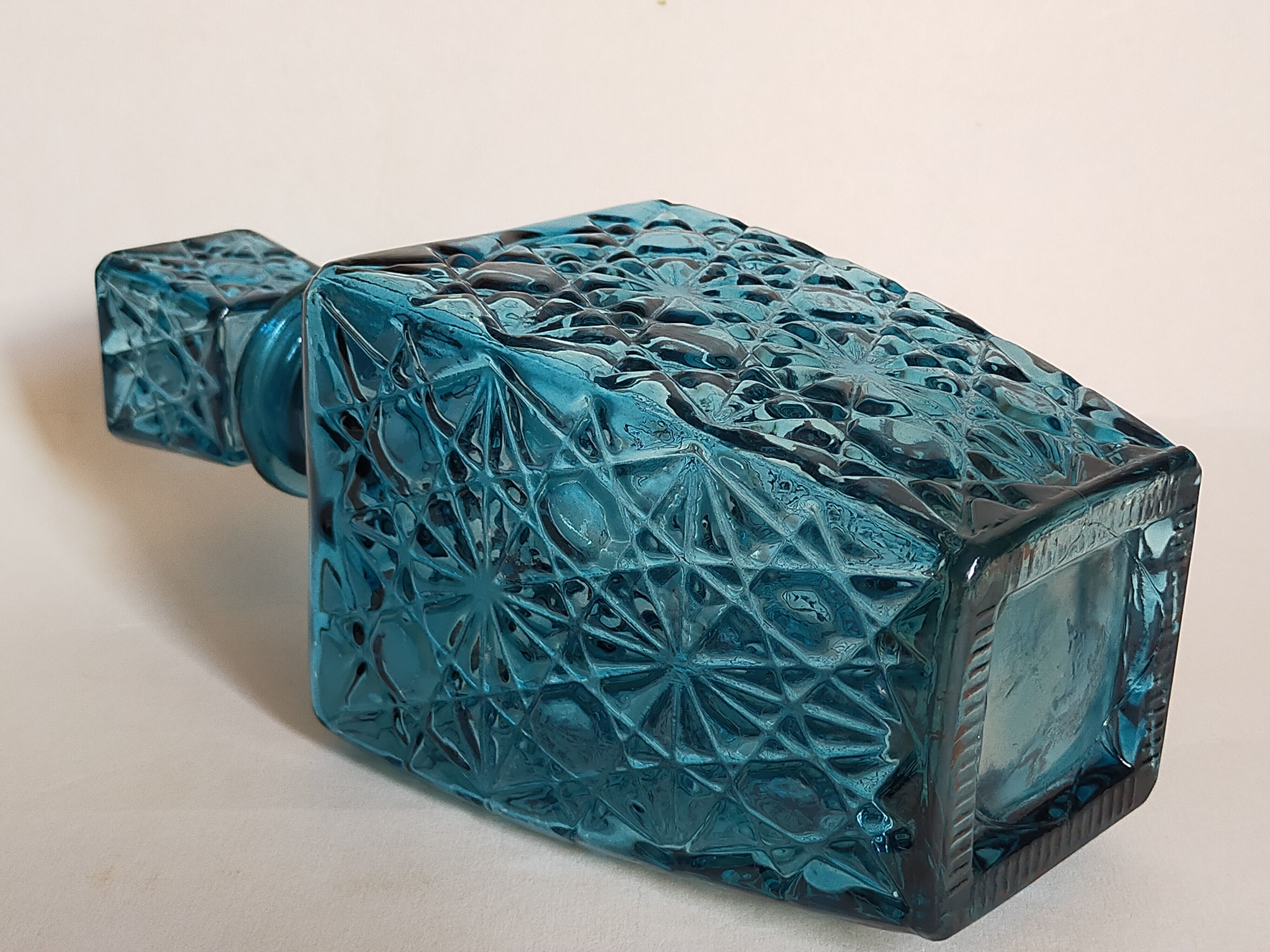 Vintage blue glass whiskey decanter