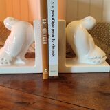 Pair of greenhouse art-deco books about cracked earthenware bird