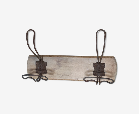 Old vintag coat rack2 metal hooks with mascarons (faces) on beech wood plate