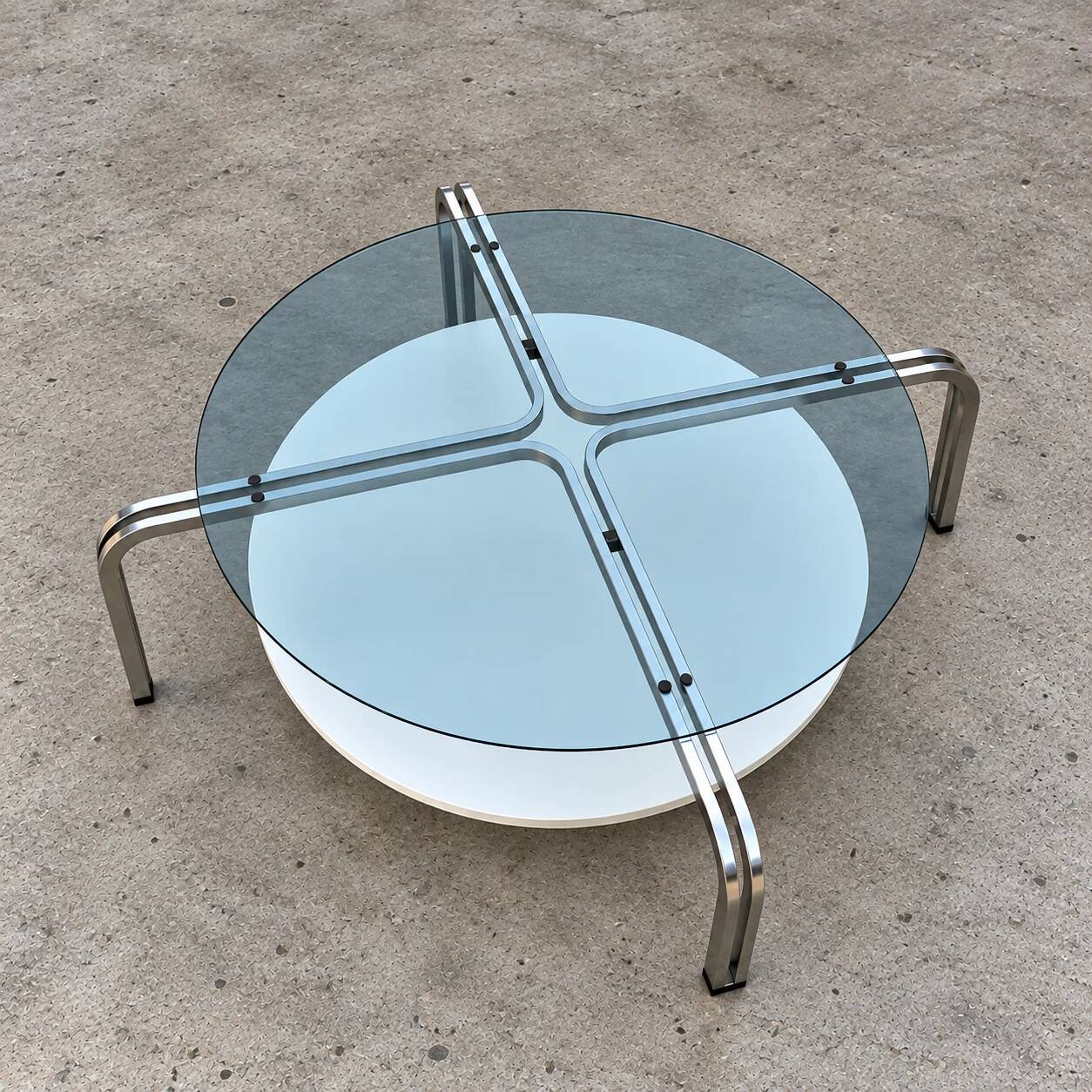 Rare coffee table / solid steel with a low free standing table / 1980s