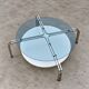 Rare coffee table / solid steel with a low free standing table / 1980s