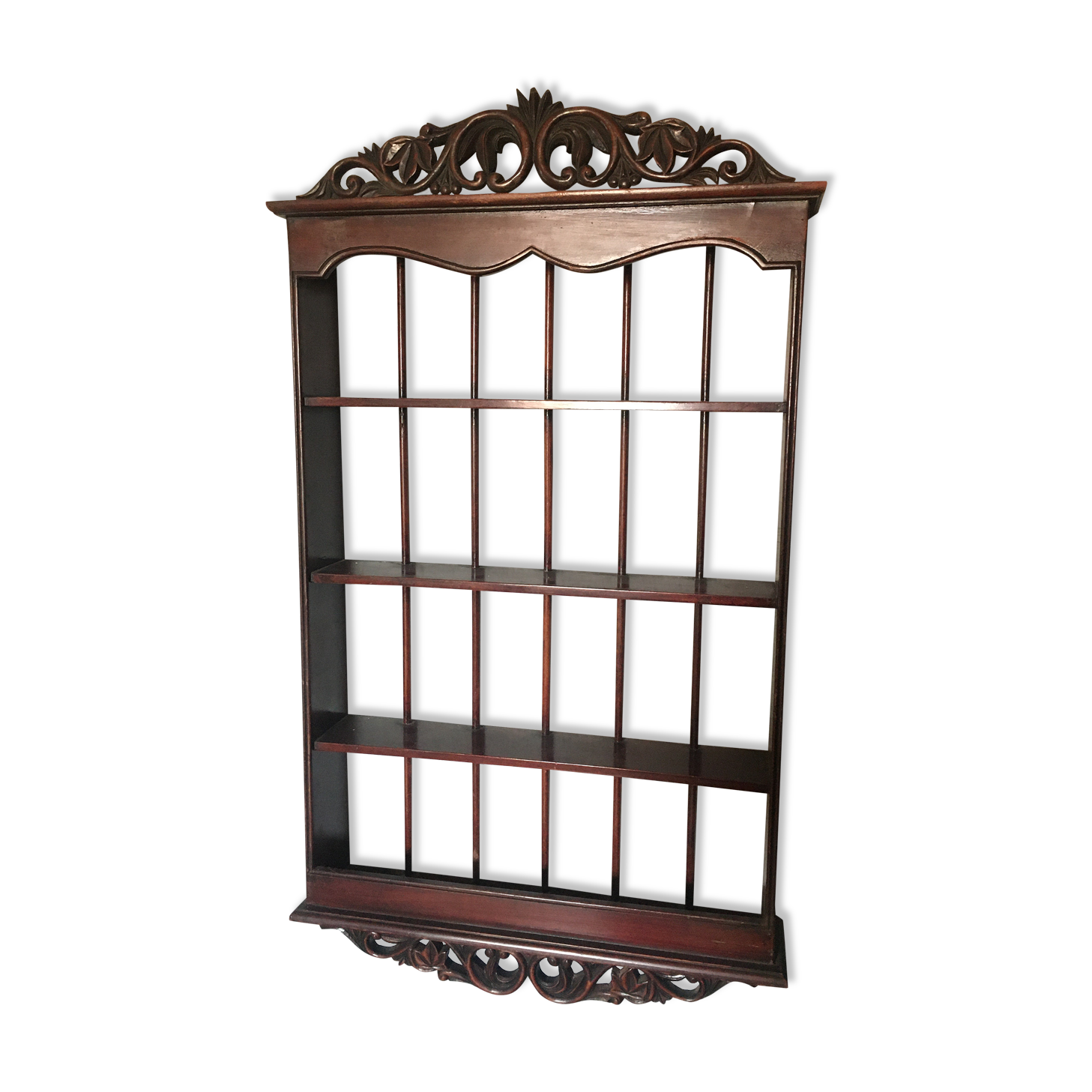 Carved wooden wall shelf for collection or other.
