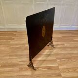 Metal fireplace screen from the period.