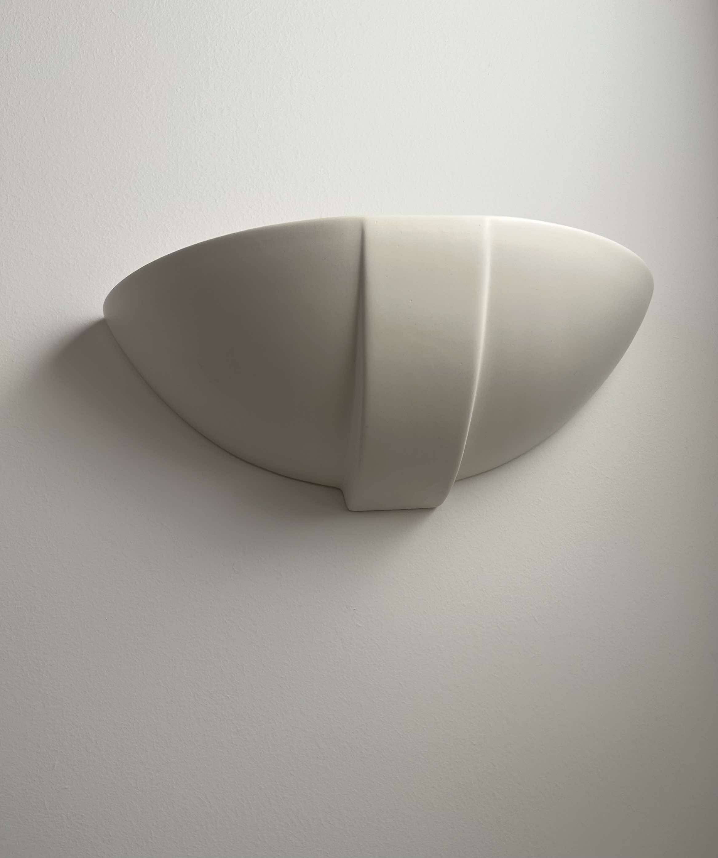 Pair of vintage matte white porcelain wall lights, France 1970.