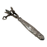 Silver-plated metal leg of lamb handle in art nouveau style