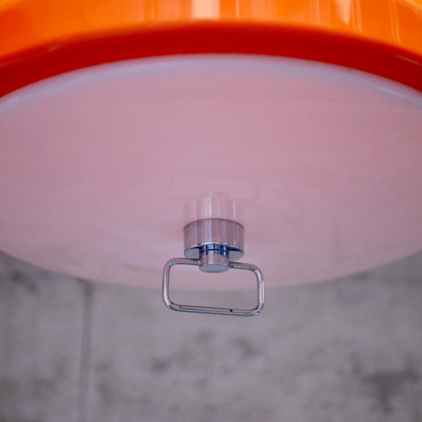 Orange space age suspension