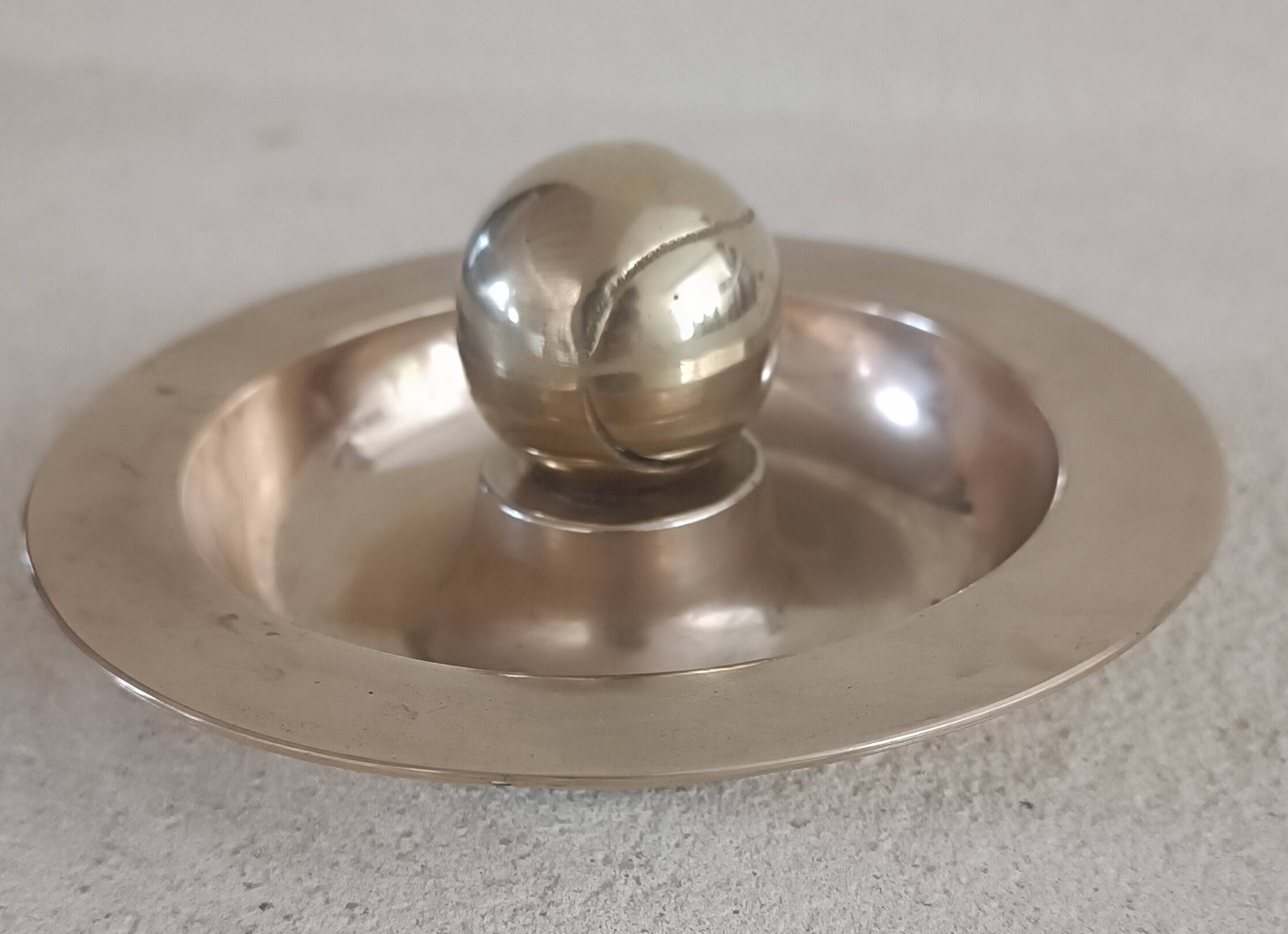Tennis ball ashtray and pocket tray