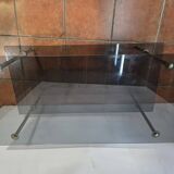 Smoked glass and brass coffee table from the 1970s.