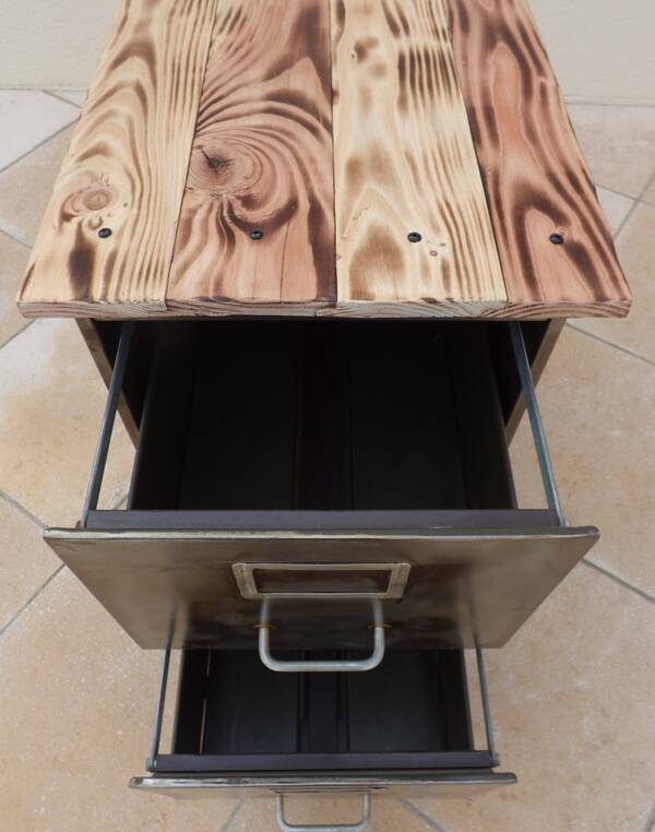 Old industrial furniture in rusty effect metal with two drawers on casters