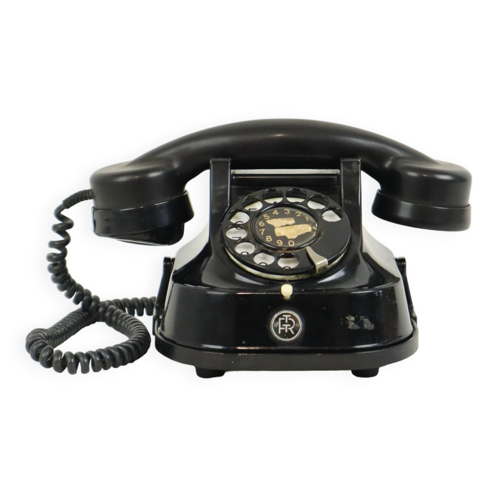 Old black telephone with rotary dial metal Bakelite RTT 56B