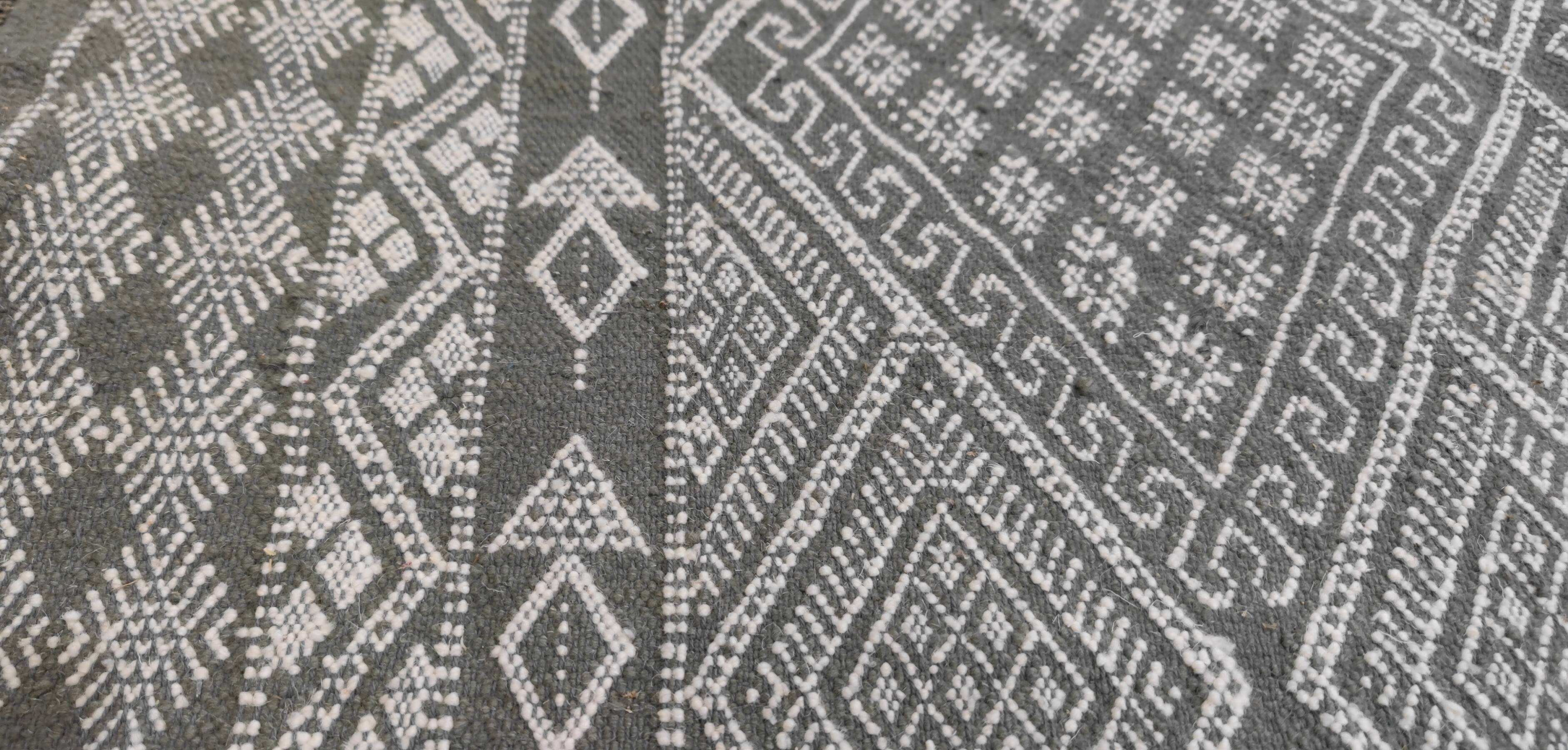 Handmade gray and white rug in natural wool