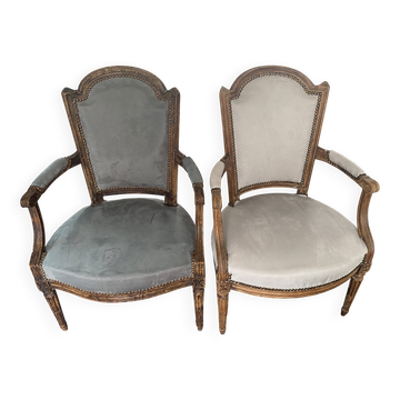 Pair of cabriolet armchairs in light grey and dark grey Louis XV style.