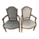 Pair of cabriolet armchairs in light grey and dark grey Louis XV style.