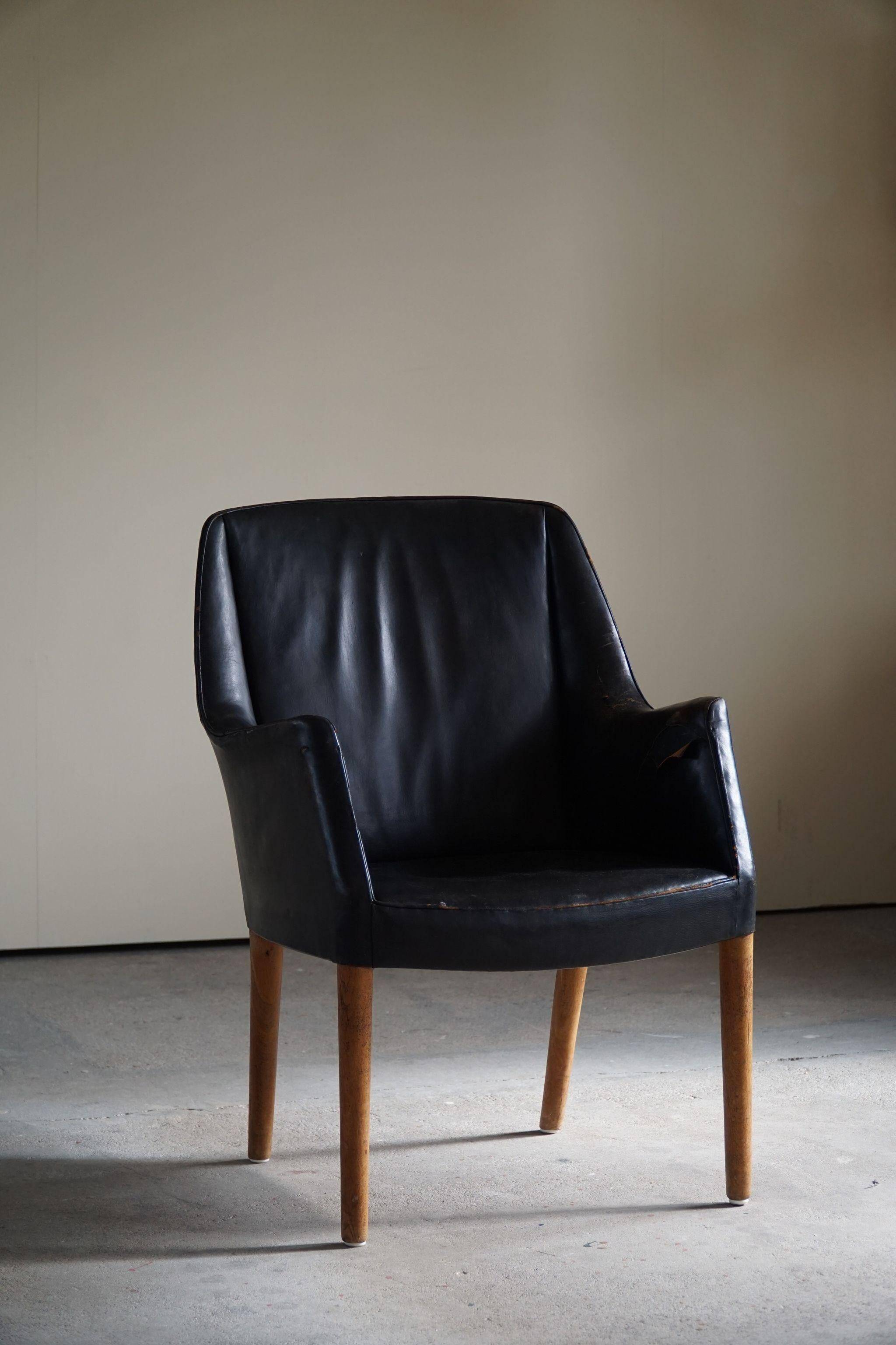 Fauteuil Danemark Moderne par Nanna Ditzel en chêne et cuir patiné, années 1950