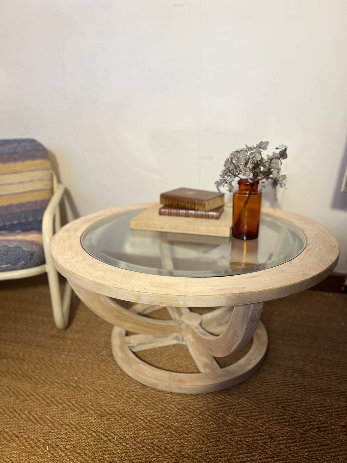 Oval patinated wood and beveled glass coffee table