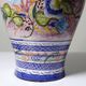 Vintage Portuguese vase in glazed terracotta with hand-painted floral decoration.