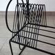 1960s metal and ceramic magazine and record rack