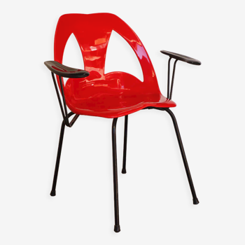 Vintage chair in thermoformed red plastic and metal circa 1970