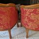 Pair of louis xv cabriolet armchairs with sculpted wood and pink & red floral fabric