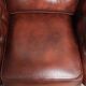 Vintage set of 2 cowhide leather Chesterfield armchairs in a brown colour