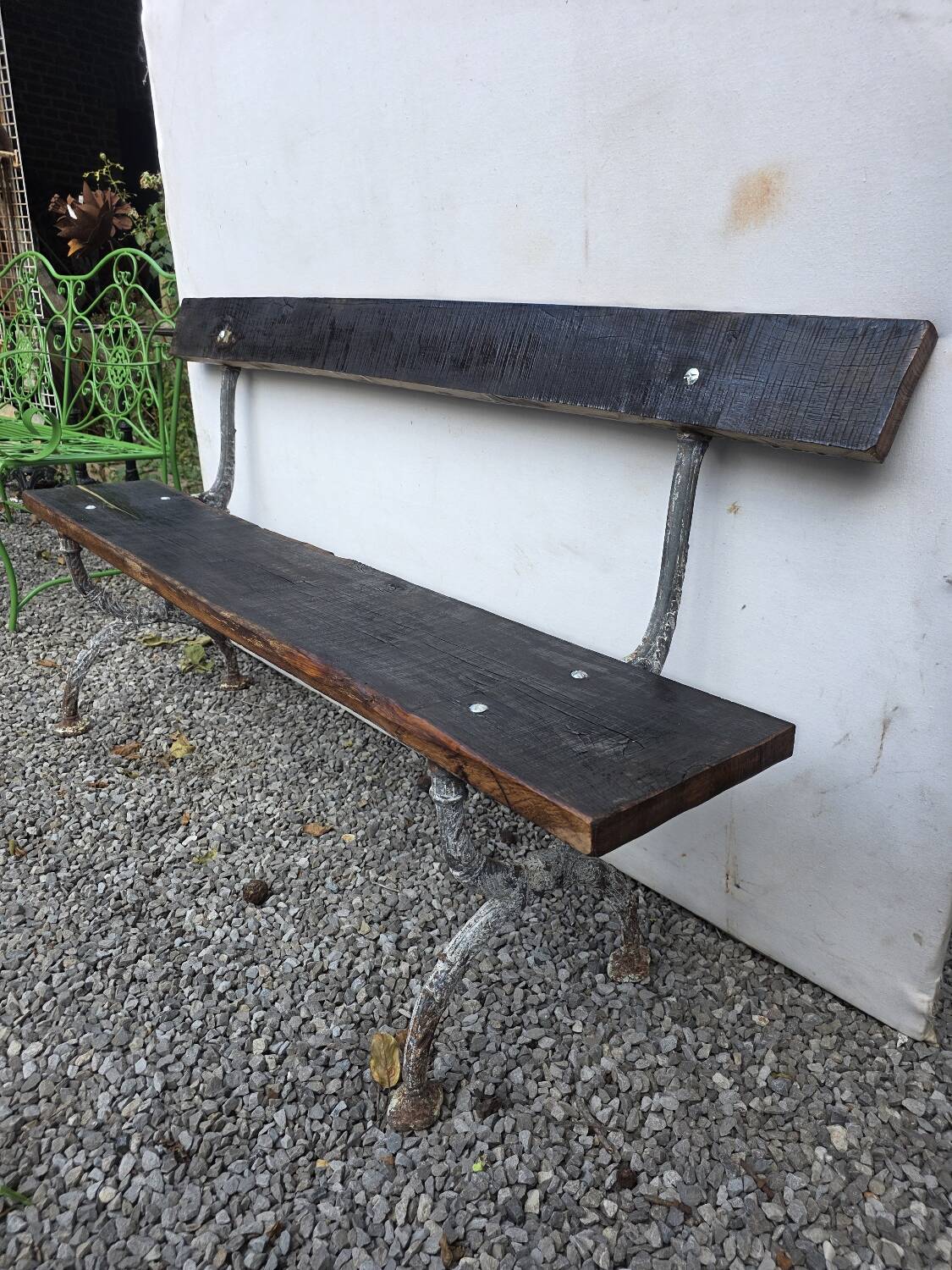 Cast iron and oak garden bench