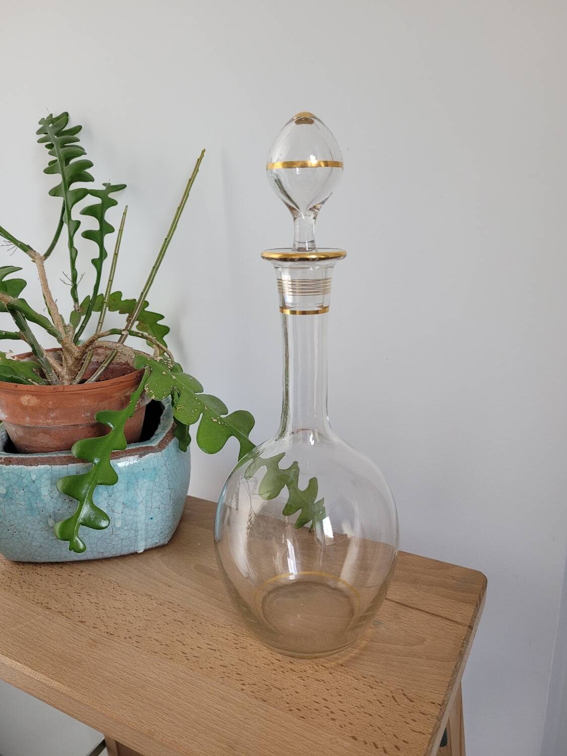 Glass carafe with gold trim