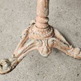 Bistro table with cast iron base and solid teak top