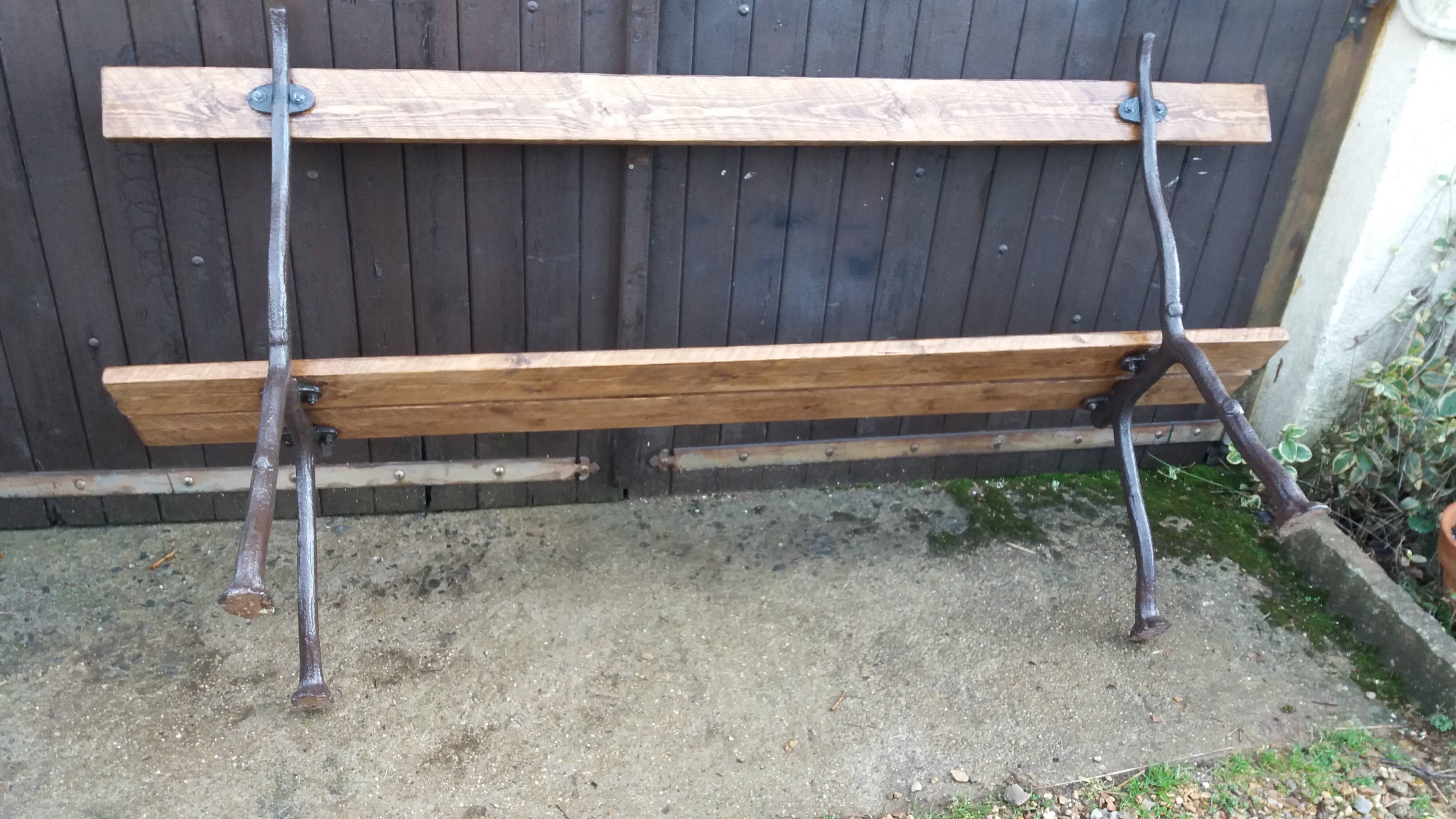 Cast iron leg garden bench