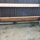 Garden bench with cast iron legs