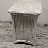 White rattan chest of drawers and bedside table