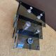 Set of 3 nesting tables in metal and smoked glass.