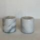 Lot of 2 White marble candlesticks, grey veins