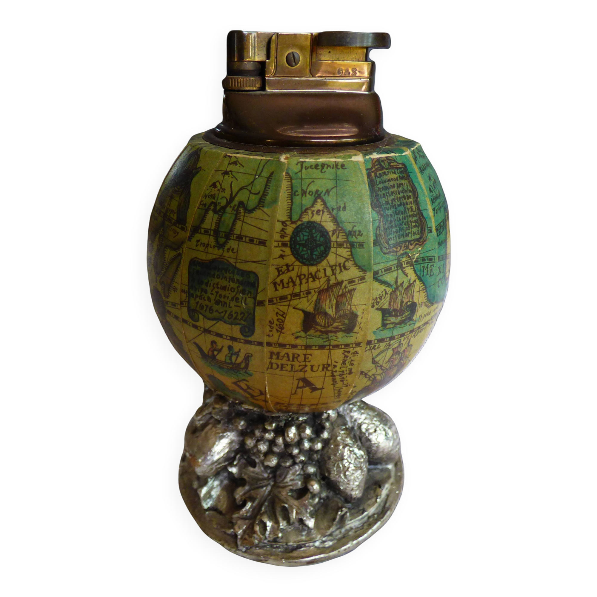 Vintage antique lighter with a globe and silver-plated stand.